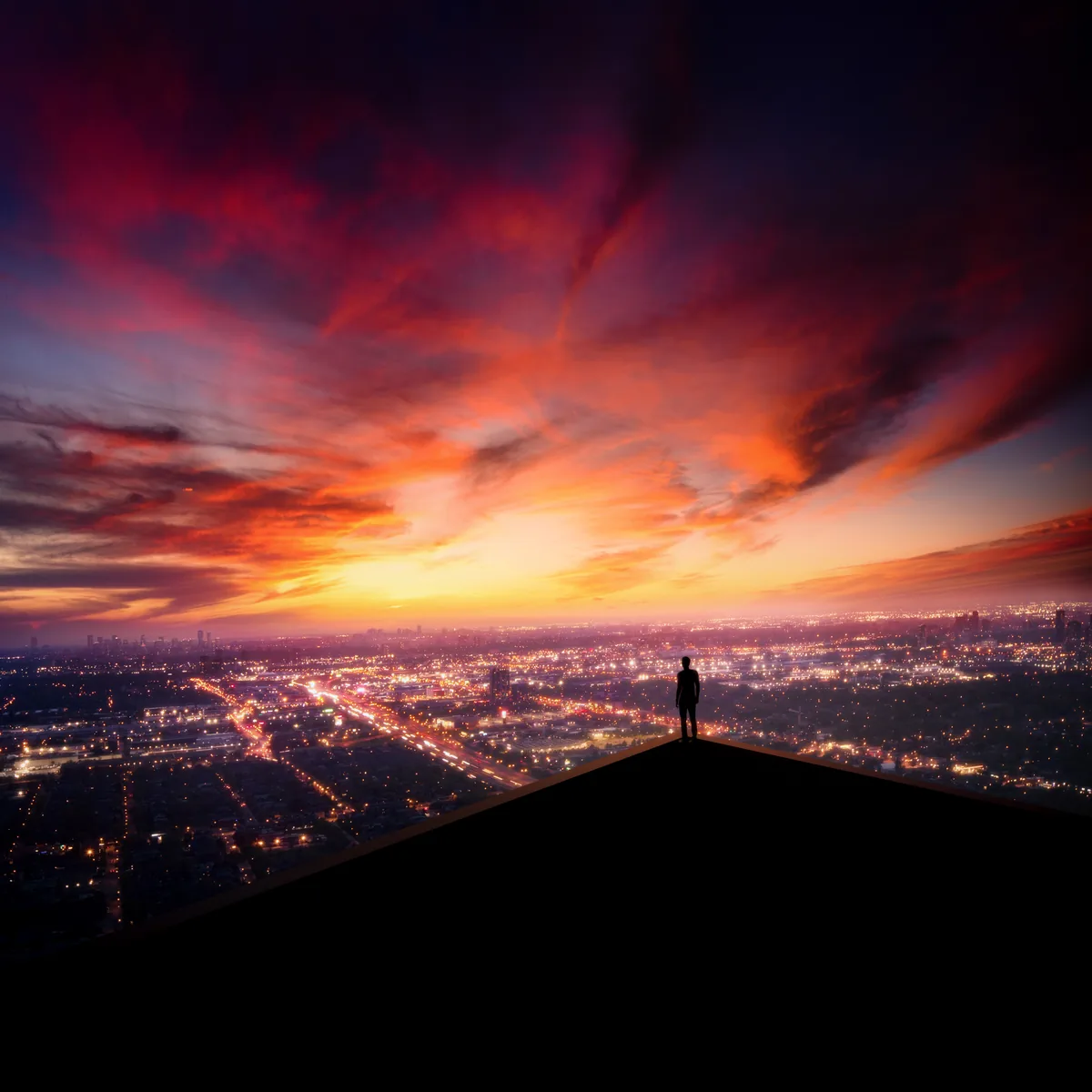 Phenomena, cover art for Shingo Nakamura on Monstercat: a lone figure on a ridge above a glowing city under a burning sky
